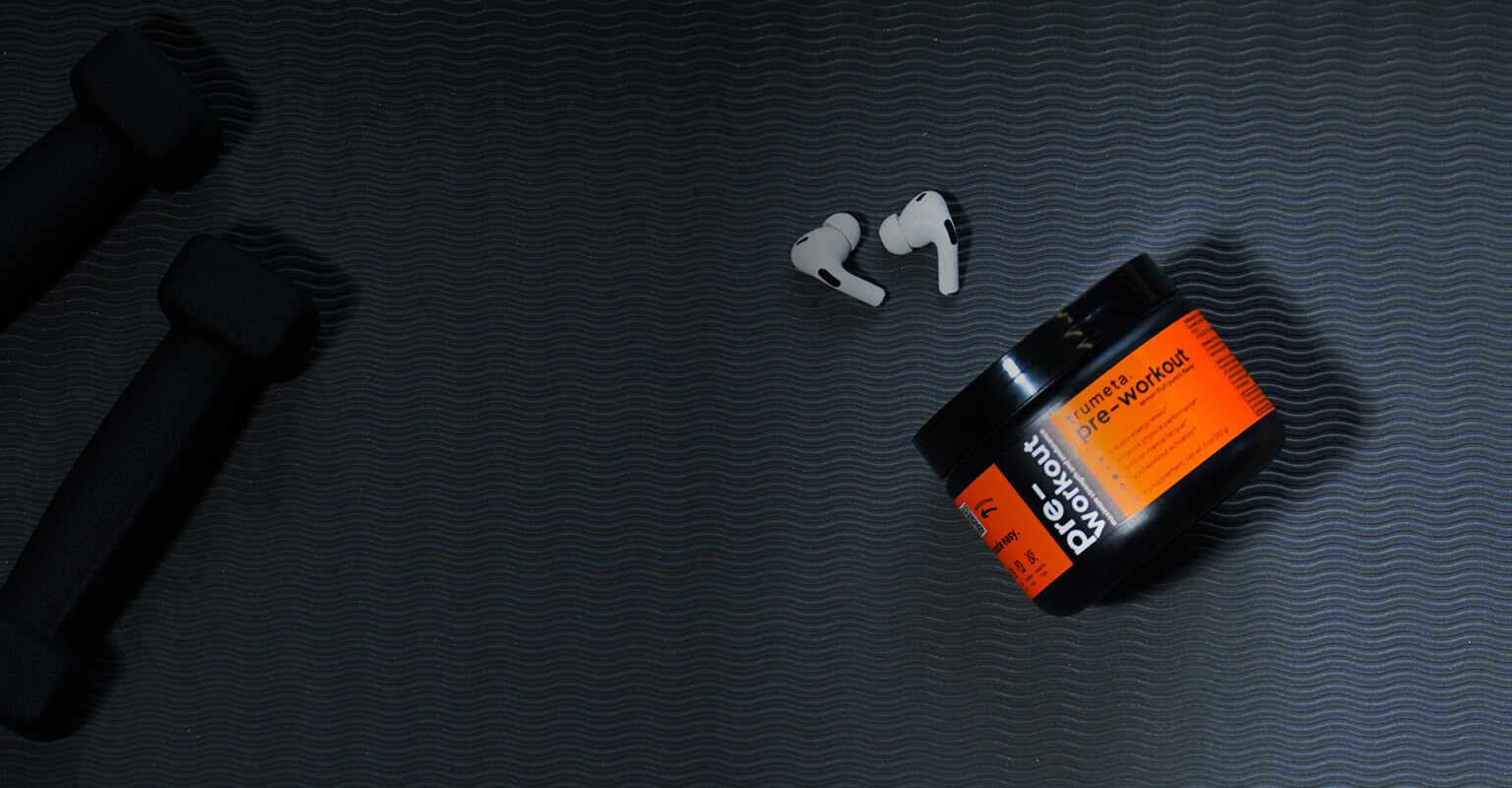 pre-workout jar and headphones